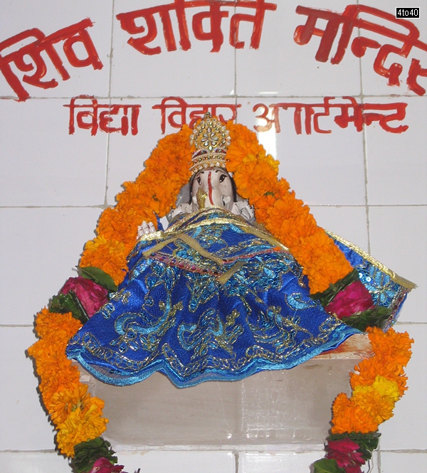 Small statue of Lord Ganesha at the entrance of Temple at Vidya Vihar, Sector 9, Rohini, New Delhi