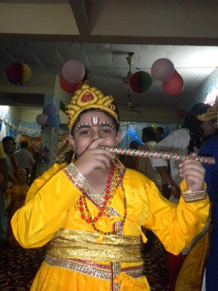 Vinny Madan dressed as lord krishna on the eve of Janmashtami celebrations at Cosy Apartments Sector 9 Rohini New Delhi