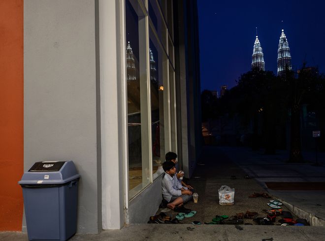 Young Malaysian Muslim kids break their fast on the first day of the holy Islamic month of Ramadan in Kuala Lumpur on June 6.