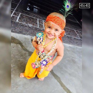 Child dressed as Bal Gopal