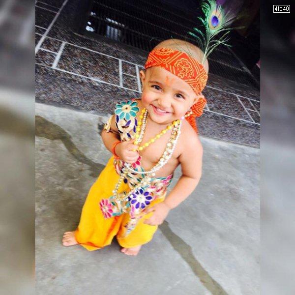 Child dressed as Bal Gopal