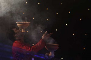 A Bangladeshi Hindu devotee offers prayers during the Durga Puja festival at a temple in Dhaka on October 20, 2015