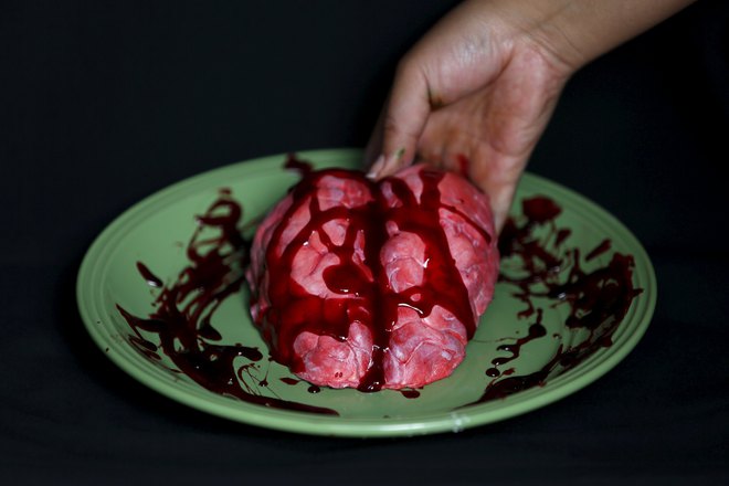 A bloody brain made of gummy candy and red jelly is pictured at the Zombie Gourmet homemade candy manufacturer on the outskirts of Mexico City on October 30, 2015.