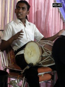 A dholka player at Mata Ki Chowki in Rohini New Delhi