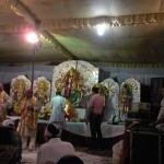Aarti being performed beside bhetein at Mata Ki Chowki in New Delhi