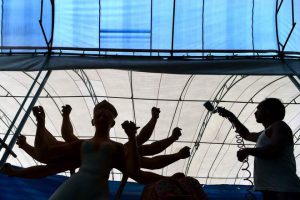 An Indian artist works on a clay idol of the Hindu goddess Durga in preparation for the upcoming Durga Puja festival at a temple in Bangkok on September 21, 2016.