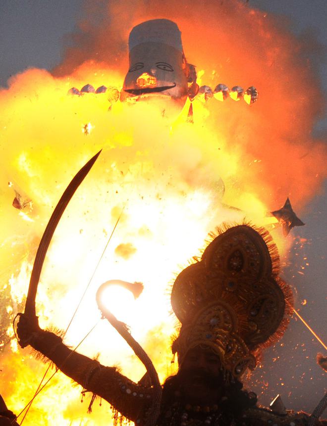 An effigy of Hindu demon king Ravana goes up in flames at Sector 17, Chandigarh, during Dusshera celebrations on October 22, 2015