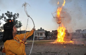 An effigy of Hindu demon king Ravana goes up in flames at the Dusshera ground in Gandhi Nagar at Jammu on October 22, 2015