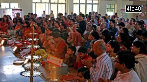 Ashtami aarti being performed at one of the durga puja venues in Gurgaon