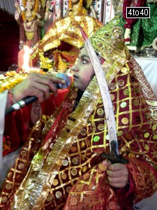 Child dressed as Maa Sherwali at a Mata Ki Chowki event in Rohini, New Delhi