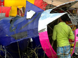 Craftsman inserting crackers inside the Ravana effigy