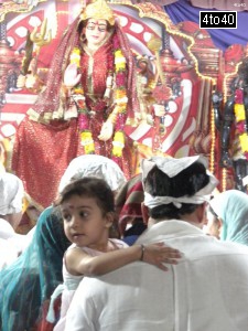 Devotees gather across the Maa Sherwali statue at a Mata Ka Jagran at Cosy Apartments, Sector 9, Rohini, New Delhi