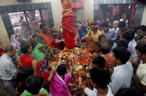 Devotees offer prayers to Goddess Alopsankari on the first day of the nine-day Navratri festival at Alopidevi temple in Allahabad