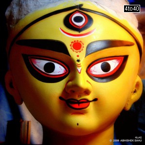 Face of Goddess Durga being prepared at a statue