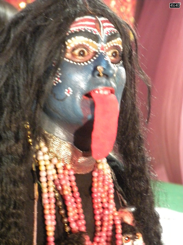 Goddess Kali has four arms and hands depicting her immense strength