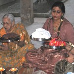 Hindu married women circulating Baya Thalis on the ocassion of Karva Chauth festival