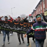 Kashmiri Shi'ite Muslims during a Muharram procession as they defied restrictions in Srinagar on October 24, 2015. Police foiled attempt of over a dozen of Shiite mourners to carry out procession on tenth day of Moharram