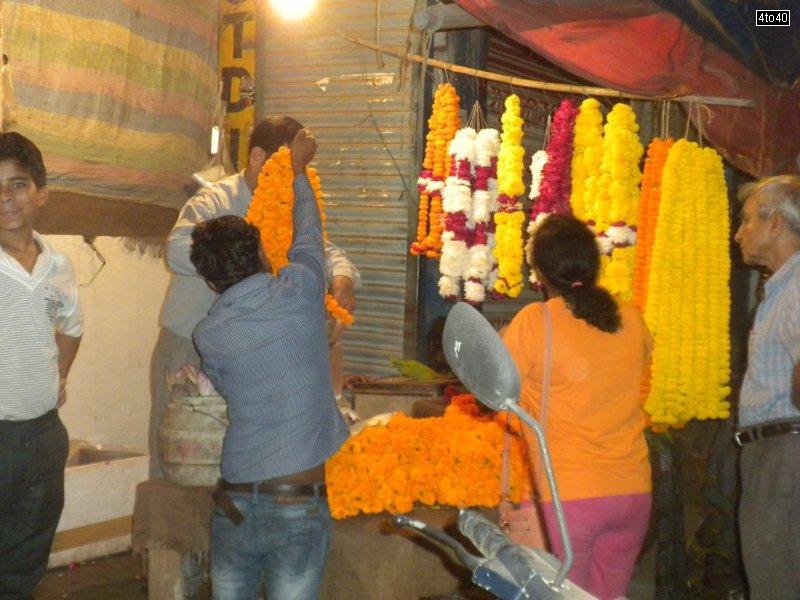 On ocassion of Navratri people decorate home temples with flowers and garlands