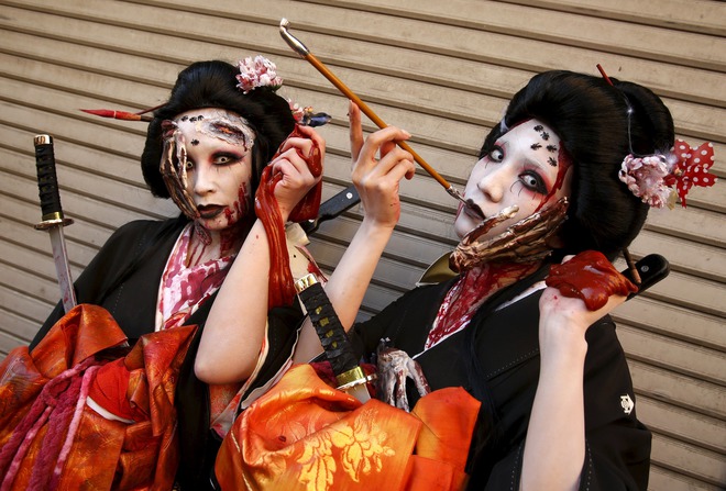 Participants in costume pose for a picture after a Halloween parade in Kawasaki, south of Tokyo, on October 25, 2015. More than 100,000 spectators turned up to watch the parade, where 2,500 participants dressed up in costumes, according to the organiser