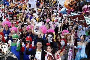 Participants in costume pose for a picture during a Halloween parade in Kawasaki, south of Tokyo, on October 25, 2015