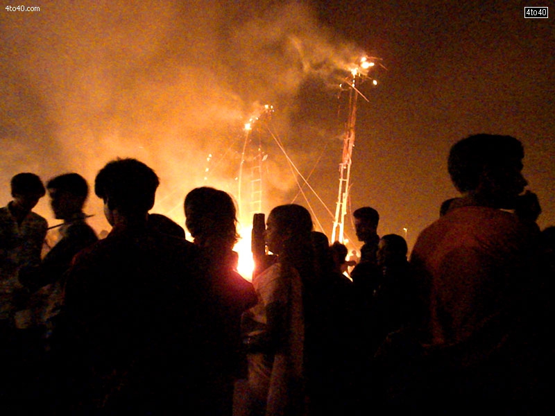 People enjoy watching burning of Ravana, Meghnath and Kumbhkaran effigies at Swarn Jayanti Park, Rohini, New Delhi