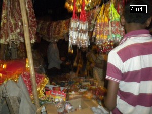 People prepare for Navratri celebration by buying Green Coconut Earthen Pots Mata Ki Chunri and other items