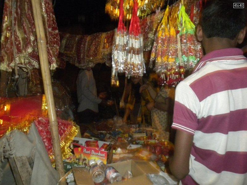 People prepare for Navratri celebration by buying Green Coconut Earthen Pots Mata Ki Chunri and other items