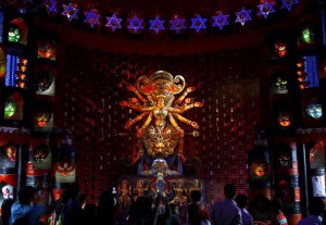 People visit a pandal during the Durga Puja festival in Kolkata on October 21, 2015