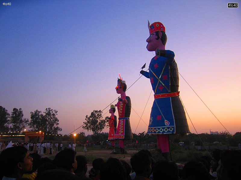 People watching effigies of Ravana, Meghnath and Kumbhkaran