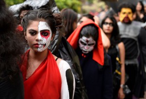 Students dressed in costume line up ahead of a Halloween fashion show in Bangalore on October 31, 2015