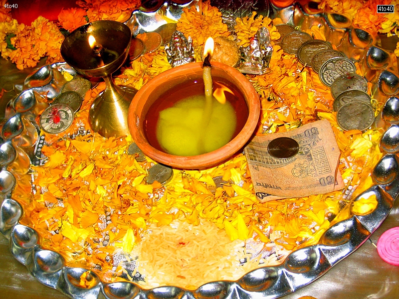 Diwali Puja Thali with earthen lamp in middle
