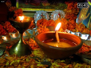 Earthen lamps are lightened and images of Gods and Goddess are decorated before performing the Diwali Puja