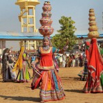 Folk artistes perform at Pushkar camel fair in Rajasthan.