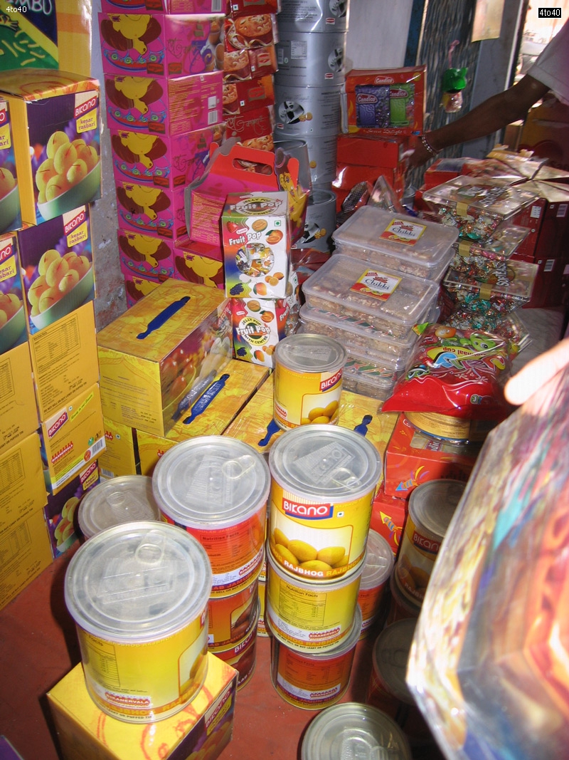 GIft packs tinned sweets chocolate Diwali gifts on display at a shop in Naharpur Grocery Market, Rohini, New Delhi