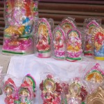 Goddess Lakshami and Lord Ganesha plaster of paris idols for sale at Nangloi Mode, New Delhi