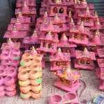 Handmade clay temples used by Hindus during the Diwali puja are on sale at Naharpur Market, Rohini, New Delhi