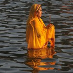 Hindu devotees offer prayers during Chhat Puja in Chandigarh on November 17, 2015