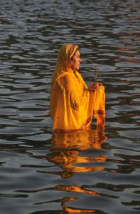Hindu devotees offer prayers during Chhat Puja in Chandigarh on November 17, 2015