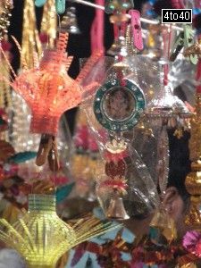 Plastic lamps and wall hangings on display