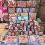 Posters and framed images of Hindu Gods and Goddess on sale on ocassion of Diwali festival at Naharpur Rohini Market in New Delhi