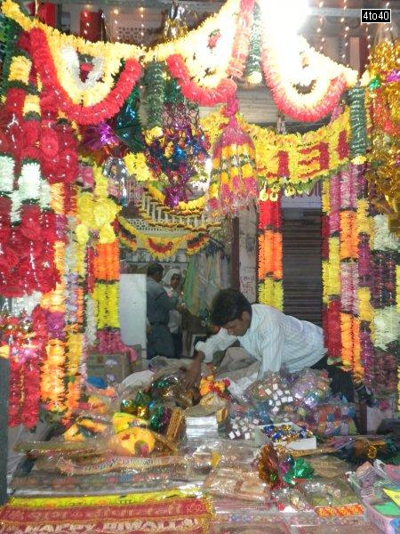 Shop selling decorative items in a weekly market near Bhagwati Hospital, Rohini, New Delhi