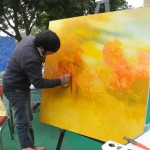 A student takes part in a painting contest at the Chandigarh Carnival in Sector 10, Chandigarh.