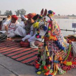 Artistes from Rajasthan rest after a performance during ‘Gita Jayanti Mahotsav’ in Kurukshetra on December 21, 2015