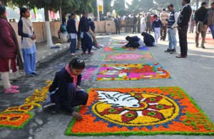 Children participate in a rangoli competition during ‘Gita Jayanti Mahotsava’ in Karnal on December 21, 2015. The festival will be celebrated across the state between December 19 and 21.