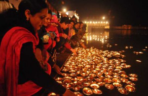 Devotees offer prayers to Braham Sarover during ‘Gita Jayanti Mahotsava’ at Braham Sarovar in Kurukshetra on December 20, 2015