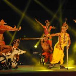 Differently-abled artistes of the Guru Syed Salahuddin Pasha's Ability Unlimited Foundation perform ‘Gita on wheelchair’ during ‘Gita Jayanti Mahotsava’ at Braham Sarovar in Kurukshetra on December 21, 2015
