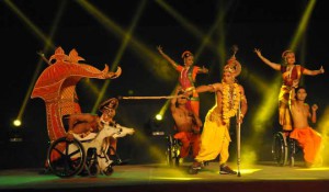 Differently-abled artistes of the Guru Syed Salahuddin Pasha's Ability Unlimited Foundation perform ‘Gita on wheelchair’ during ‘Gita Jayanti Mahotsava’ at Braham Sarovar in Kurukshetra on December 21, 2015