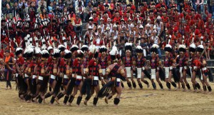 Naga Khiamiungan tribals perform a warrior dance on the fourth day of the annual Hornbill Festival at Kisama, on the outskirts of Kohima on December 4, 2015. The Hornbill Festival, which is taking place from December 1–10 in the capital of the northeastern Indian state of Nagaland, celebrates the cultural heritage of the Nagas.