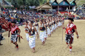 Naga tribals perform a folk dance on the fourth day of the annual Hornbill Festival at Kisama, on the outskirts of Kohima on December 3, 2015.