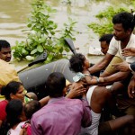 People being rescued from Kotturpuram after heavy rains in the city on December 2, 2015.